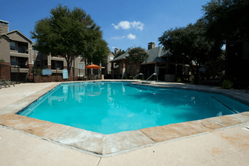 Sparkling swimming pool with heated spa